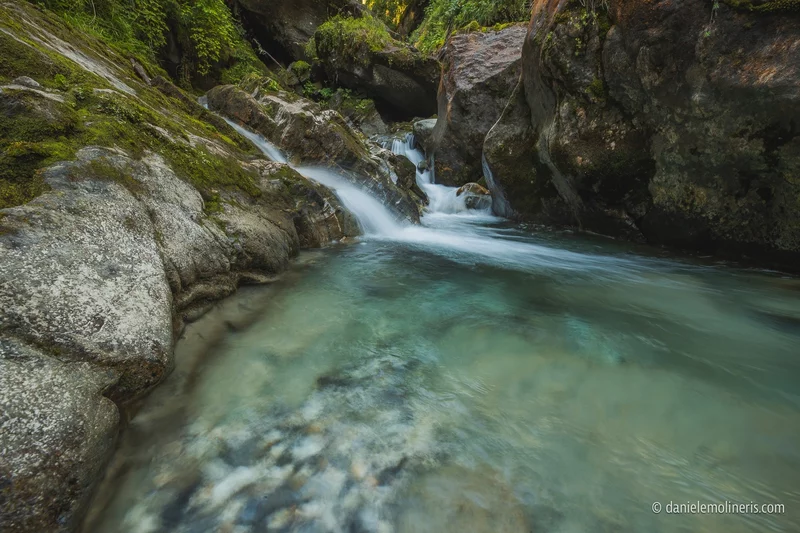 Cascata della Cravatta,  waterfall and the crocuses of Malga D’Arnò